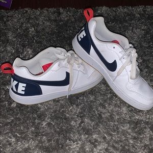 Boys Nike low top basketball sneakers.